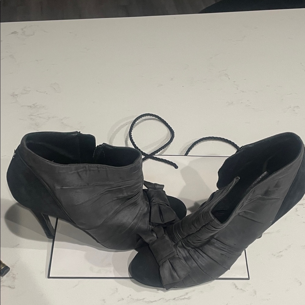 CHANEL Black Heeled Boots with Bow Accent - Picture 7 of 9